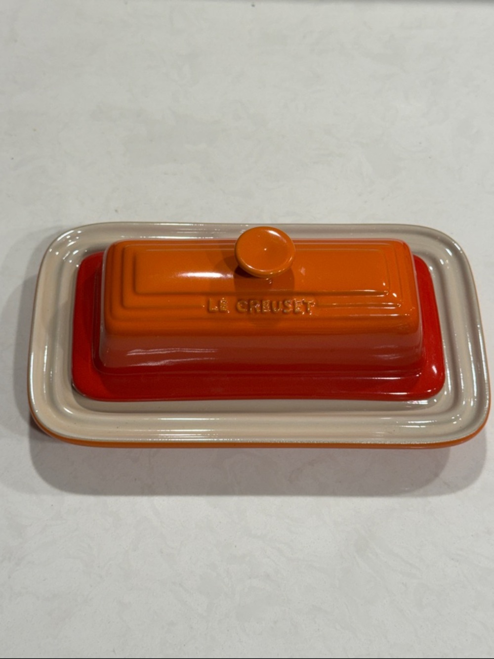 Le Creuset Orange and Red Covered Butter Dish